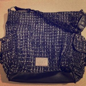 Black and white plaid bag with woven strap